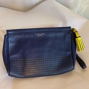Navy and yellow Coach Wristlet